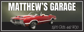 Customized sign for a red 1970 Oldsmobile 442 Convertible, featuring personalized text options. Ideal for car enthusiasts to display in garages or themed spaces.