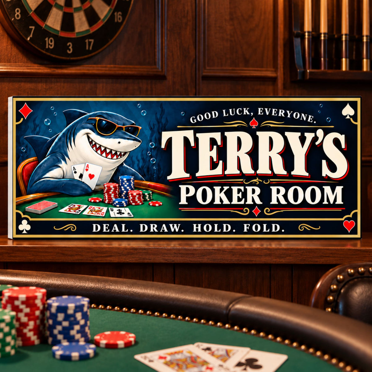 Custom card shark poker sign displayed in a wood-paneled game room with a dartboard, pool cues, and poker chips.