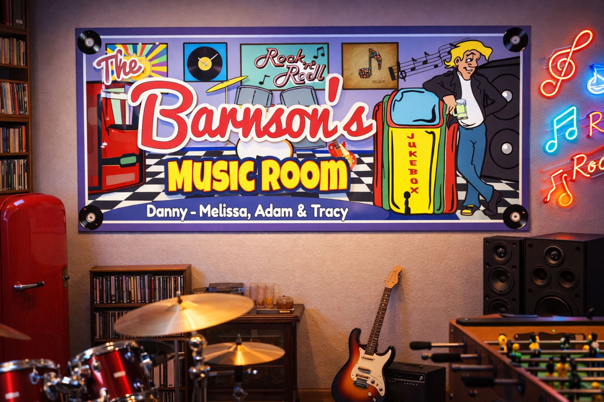 Music room sign displayed in a home man cave with instruments, neon lighting, and entertainment decor.
