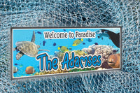 Customized Ocean Oasis: Personalized Underwater Welcome Sign featuring a vibrant coral reef backdrop adorned with a sea turtle, tropical fish, stingray, and eel.