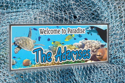 Customized Ocean Oasis: Personalized Underwater Welcome Sign featuring a vibrant coral reef backdrop adorned with a sea turtle, tropical fish, stingray, and eel.