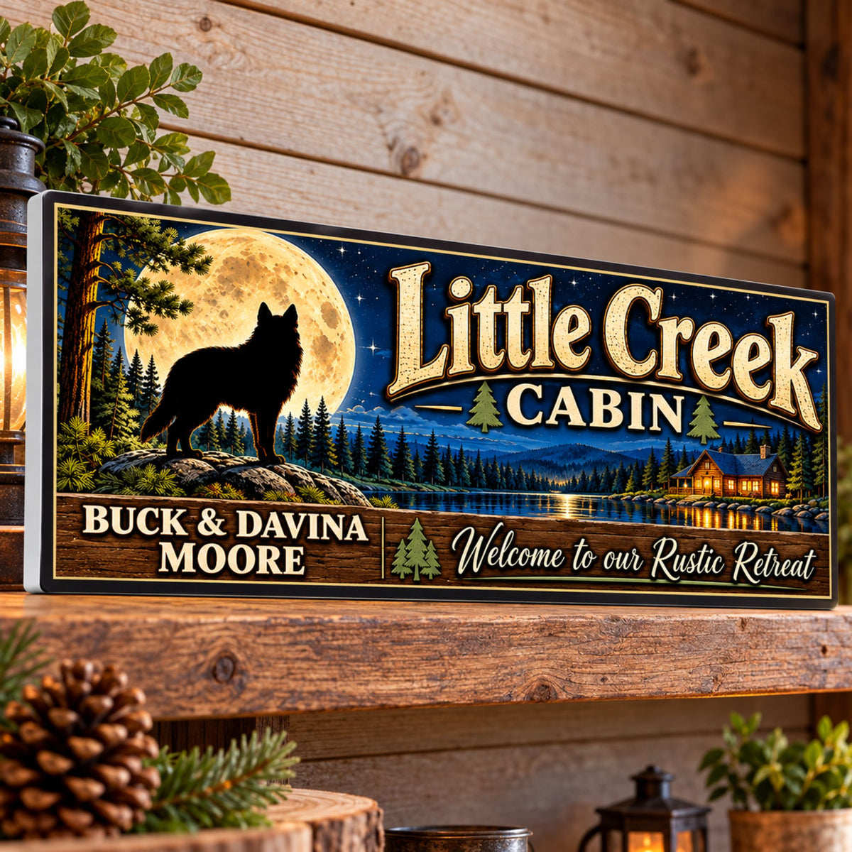 Custom wolf and moon cabin sign displayed on a rustic wooden shelf with pinecones and greenery, showing rigid PVC thickness.