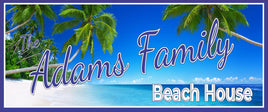 Personalized beach house sign featuring a blue ocean, sandy shoreline, and green palm trees, with customizable family name text, printed on durable vinyl mounted to rigid PVC for indoor or outdoor display, available in multiple sizes, made in the USA by a veteran