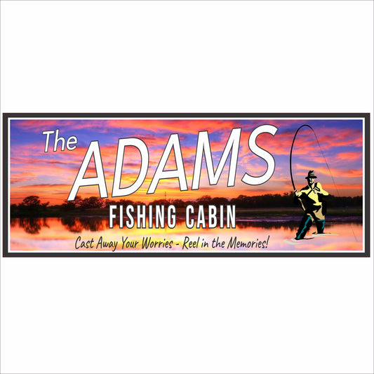 Personalized Adams Fishing Cabin sign with sunset lake background and fisherman silhouette