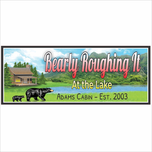 Personalized lake cabin sign with bear illustration, forest background, and customizable family name