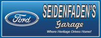 Image of a custom Ford logo sign with dark blue border, personalized for garage décor and automotive enthusiasts.