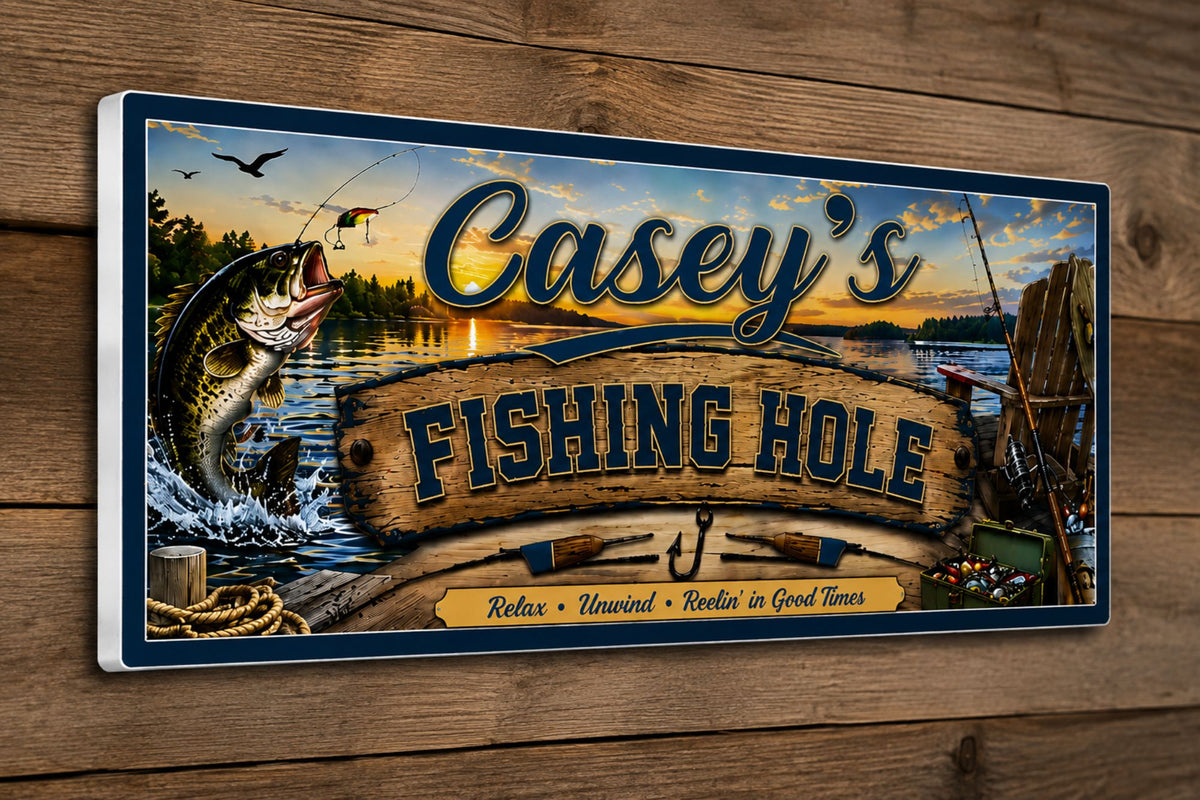Personalized Fishing Hole sign mounted on a rustic wood wall, featuring a jumping fish and sunset lake scene.