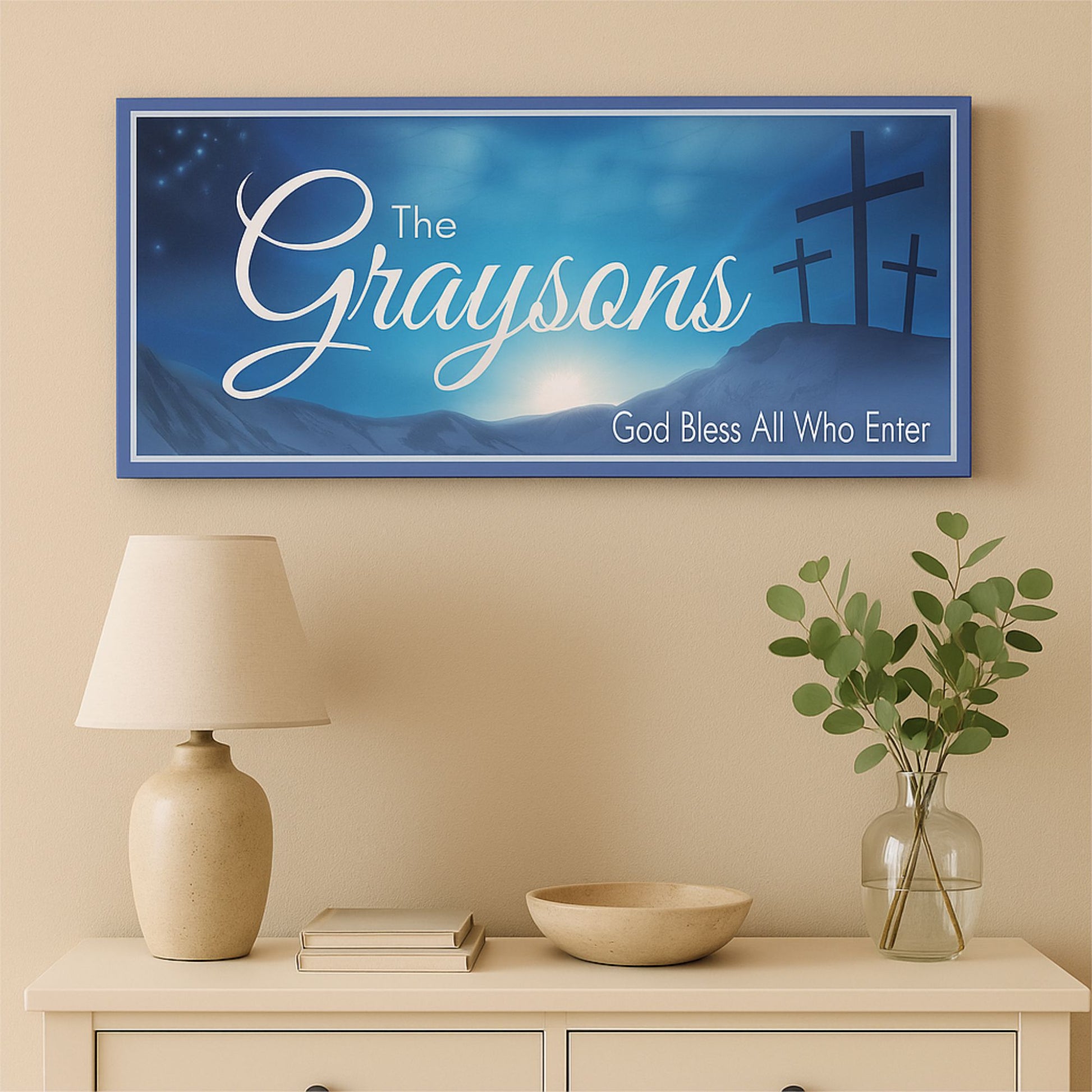 Personalized Christian family welcome sign displayed on an indoor entryway wall above a console table, featuring crosses and a faith-inspired blessing.
