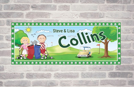 Personalized sign featuring a happy couple in golf attire, leaning against their golf bags next to a golf cart, with customizable text areas for names and messages. The setting is outdoors, possibly on a golf course, emphasizing a casual and sporty theme.