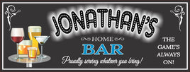 Custom bar sign featuring the text 'The Game's Always On' with a background in customizable team colors, displaying various mixed drink illustrations and personalized text options. Note: This sign does not light up.