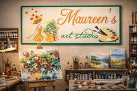 Personalized art studio sign mounted on a wall in a professional artist workspace with paintings and supplies
