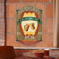 Customizable Old Irish Pub Sign with toasting beer steins and frothy tops set against a wood grain background, enhanced by a vintage font for personalization. Edit any text, including name and established date, to create a unique and personalized gift.