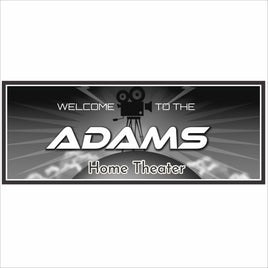 Personalized home theater sign with film camera graphic, spotlight rays, and bold marquee lettering