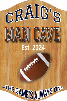 Personalized man cave sign with light wood plank background, football graphic, bold sports lettering, editable name and est. year, printed vinyl mounted on rigid PVC, made in USA