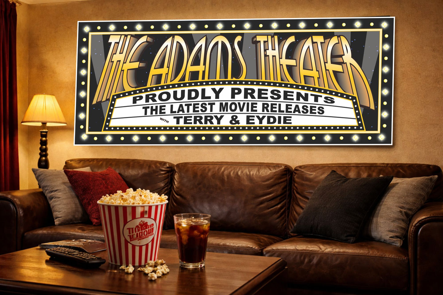 Home theater room with leather couch, popcorn, and a marquee-style movie sign mounted on the wall