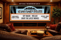 Custom home theater sign displayed in a cozy movie room with seating and screen