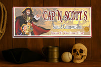 Custom pirate tavern sign displayed on a bar wall with nautical décor and rum bottles