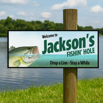 Custom fishing sign mounted on a wooden post beside a lake