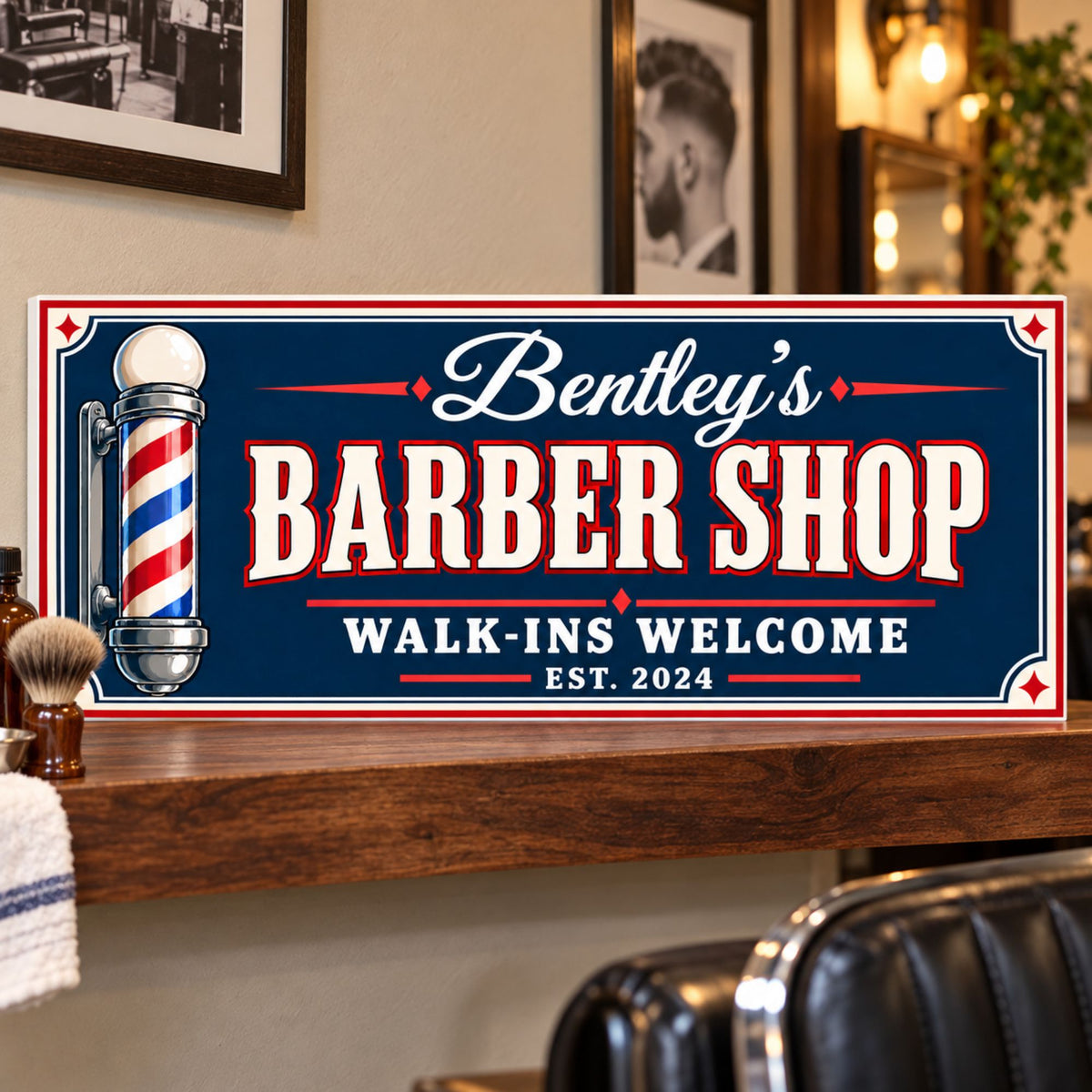Personalized navy, ivory, and red barber shop sign displayed on a walnut shelf, with a classic barber pole illustration and a subtle white PVC edge on the left.