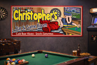 Custom bar and game room sign mounted on a wall in a home game room with pool table and dartboard