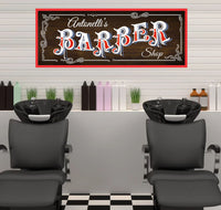 Retro barber shop sign in red, white, and blue with a weathered wood background, featuring the non-editable word 'Barber' and customizable text areas.