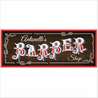 Close-up of personalized barber shop sign with fixed “Barber” text, vintage lettering, and decorative borders