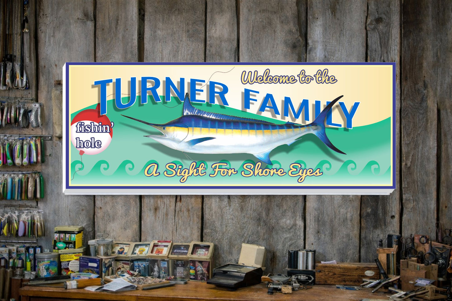 Custom fishing wall sign displayed in a coastal tackle shop with fishing gear