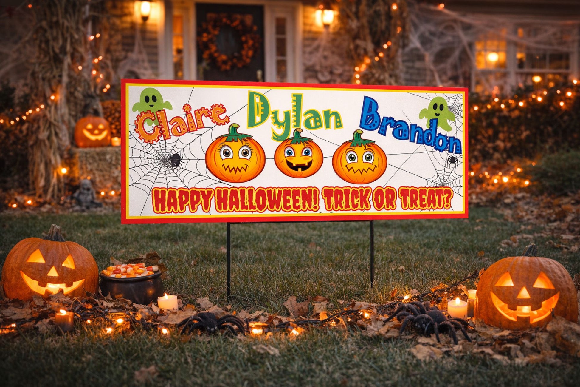 custom halloween sign displayed on a yard post with pumpkins and fall decorations