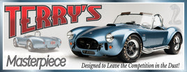 Personalized classic car garage sign featuring a blue vintage roadster with bold red lettering
