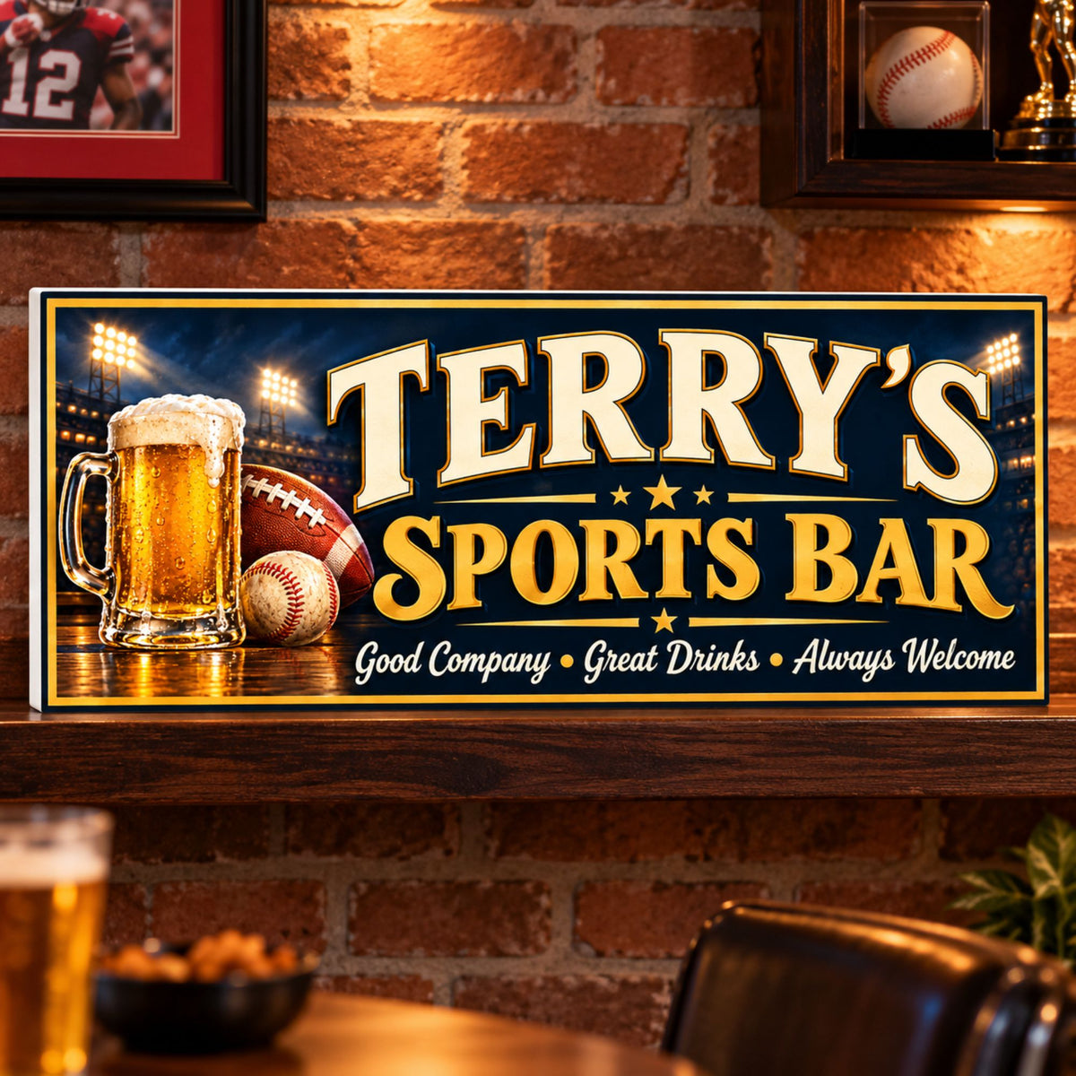 Custom sports bar sign displayed on a shelf against a brick wall with sports memorabilia and warm lighting.