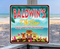 Personalized tiki bar sign featuring tiki masks, tropical drinks, ocean background, and palm fronds with editable text.