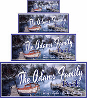 Personalized dock sign featuring a wood dock, rowboat, and snowy winter scene.
