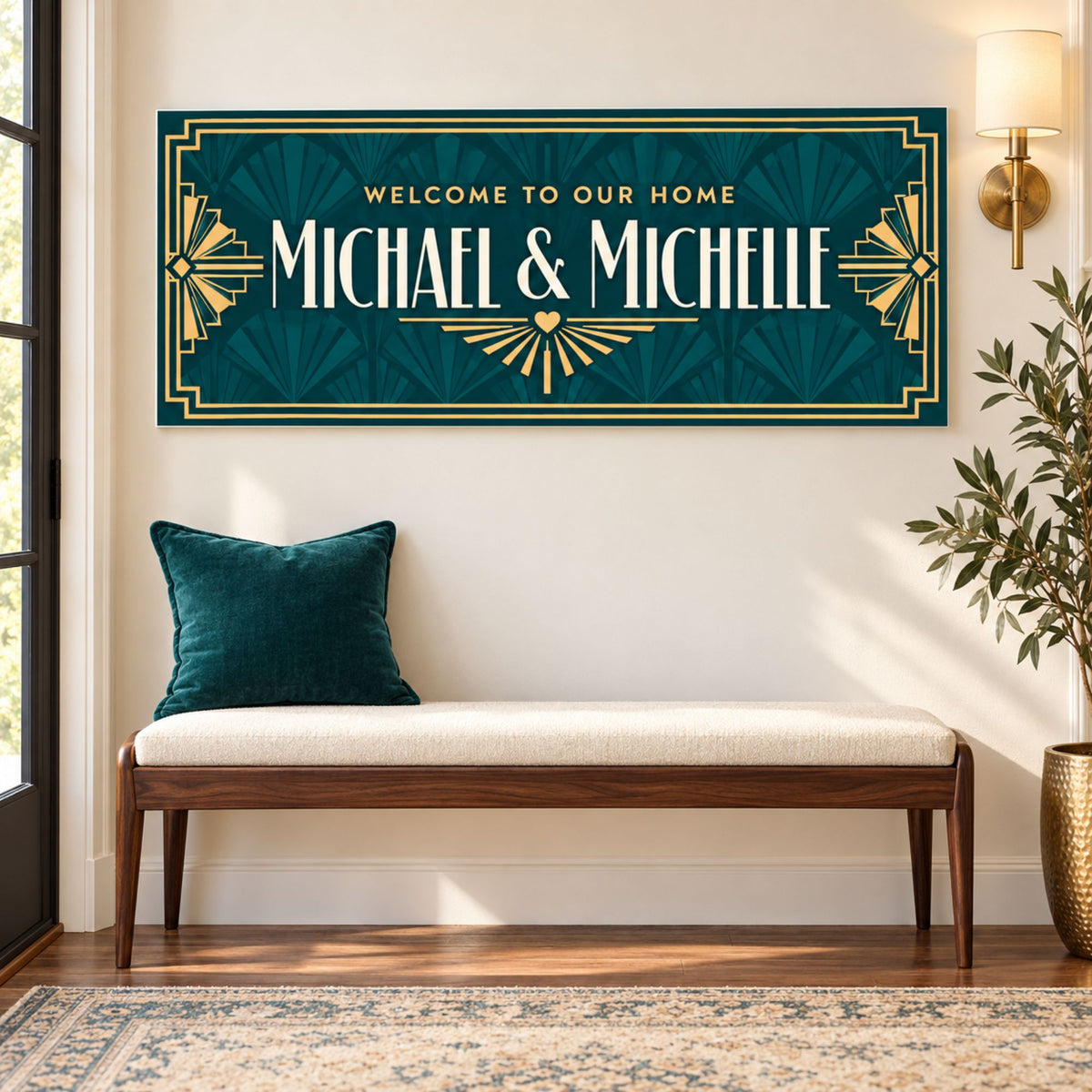 Custom Art Deco welcome home sign mounted above an entryway bench with teal cushion and elegant home decor.