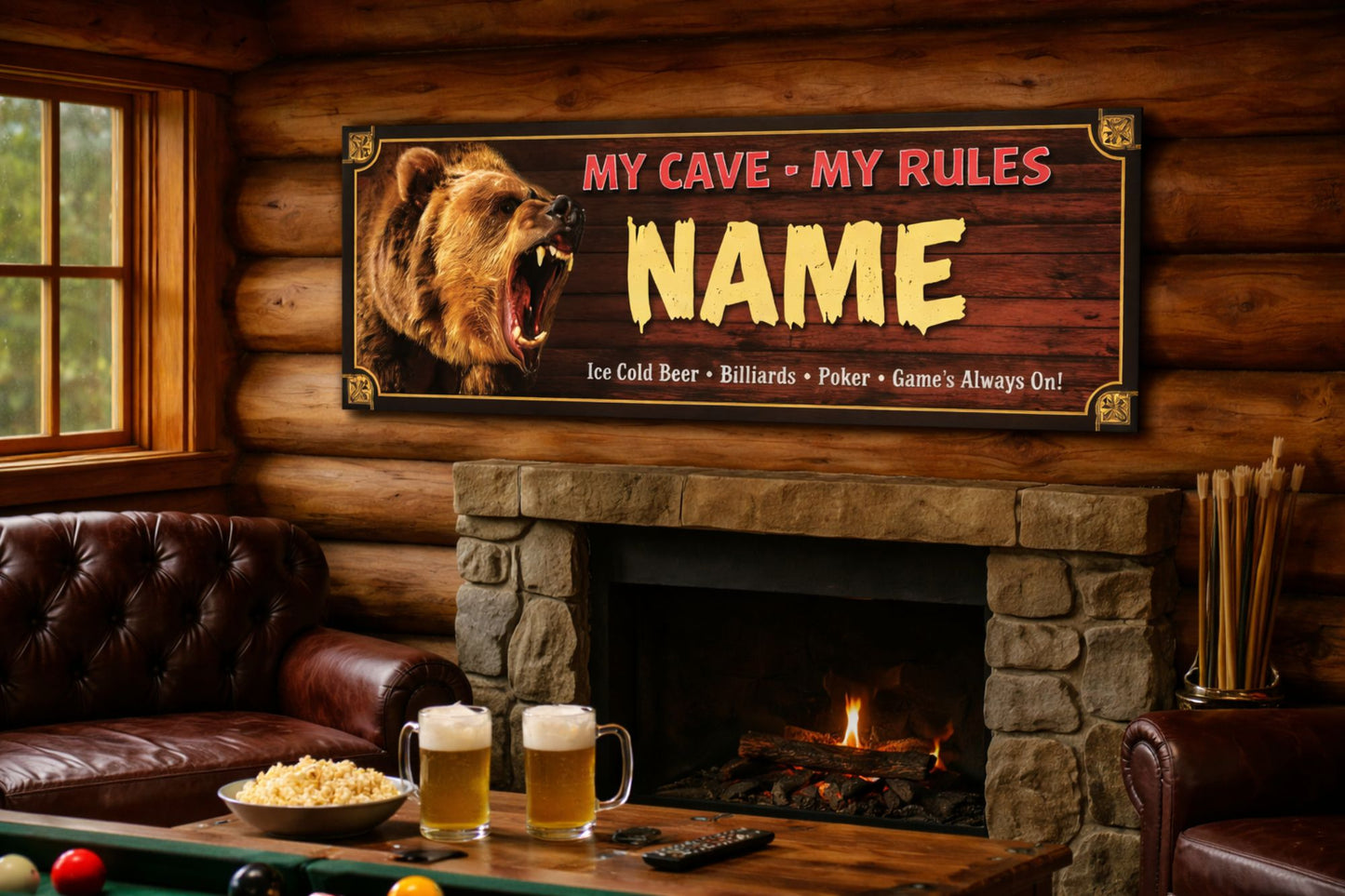 Personalized bear-themed man cave sign mounted above a stone fireplace in a rustic log cabin room with leather seating, pool table, beer mugs, and warm ambient lighting