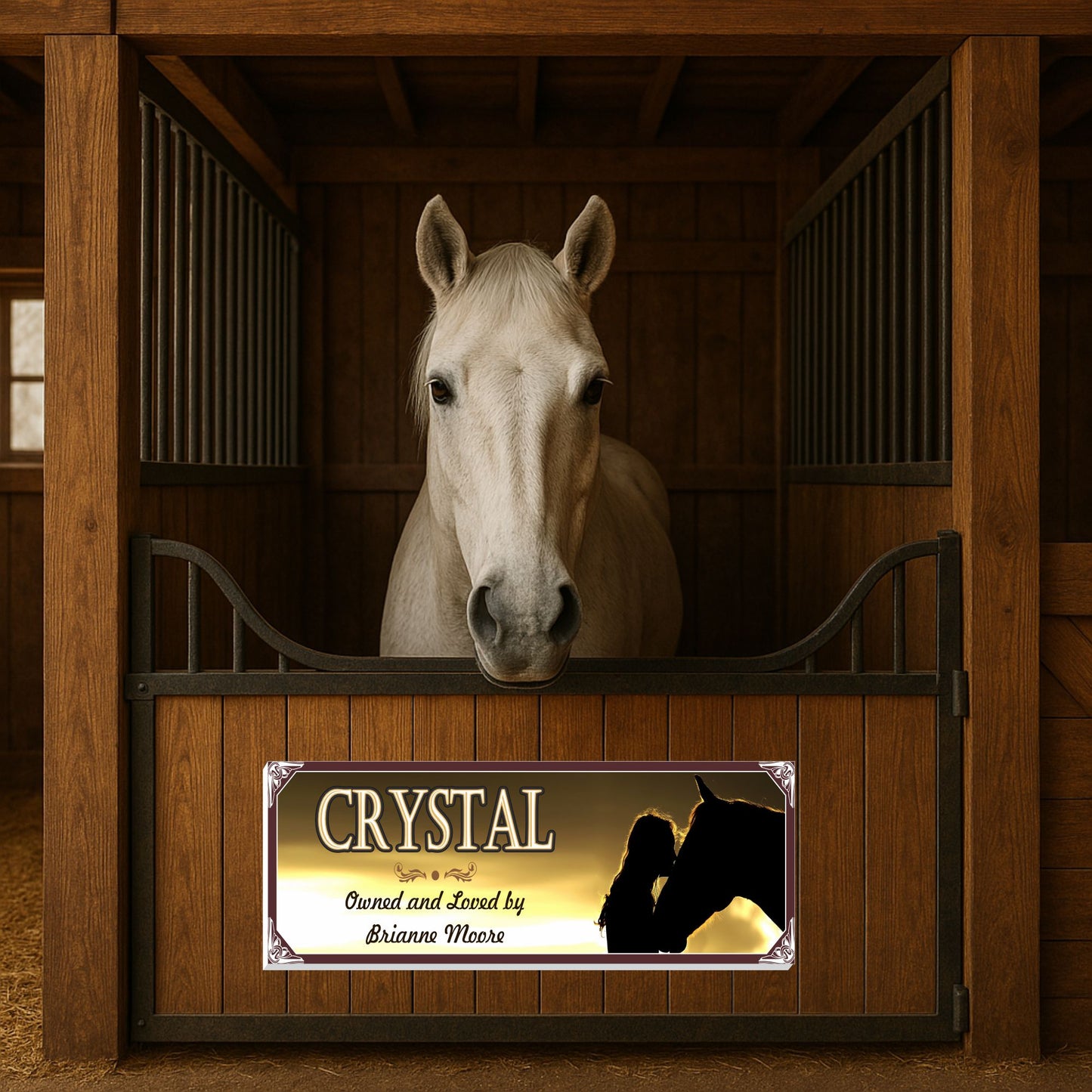 Horse standing in a wooden stall with a personalized horse name sign mounted on the gate, featuring a horse and rider silhouette at sunset, customizable wording
