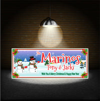 Personalized Christmas sign featuring Mr. and Mrs. Snowman with editable text lines for custom holiday greetings or family names.