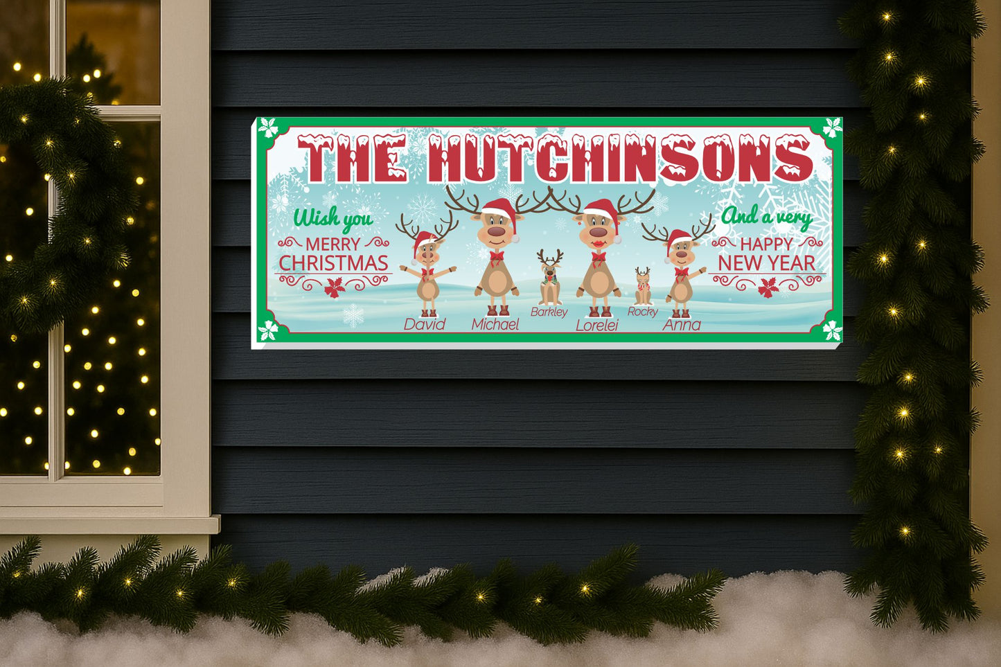 Christmas family reindeer sign displayed on a porch with holiday lights and winter décor