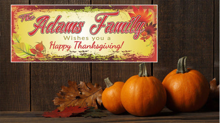 Personalized Happy Thanksgiving sign featuring a family name, colorful fall leaves background, and editable text for a custom greeting.