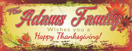 Personalized Happy Thanksgiving sign featuring a family name, colorful fall leaves background, and editable text for a custom greeting.