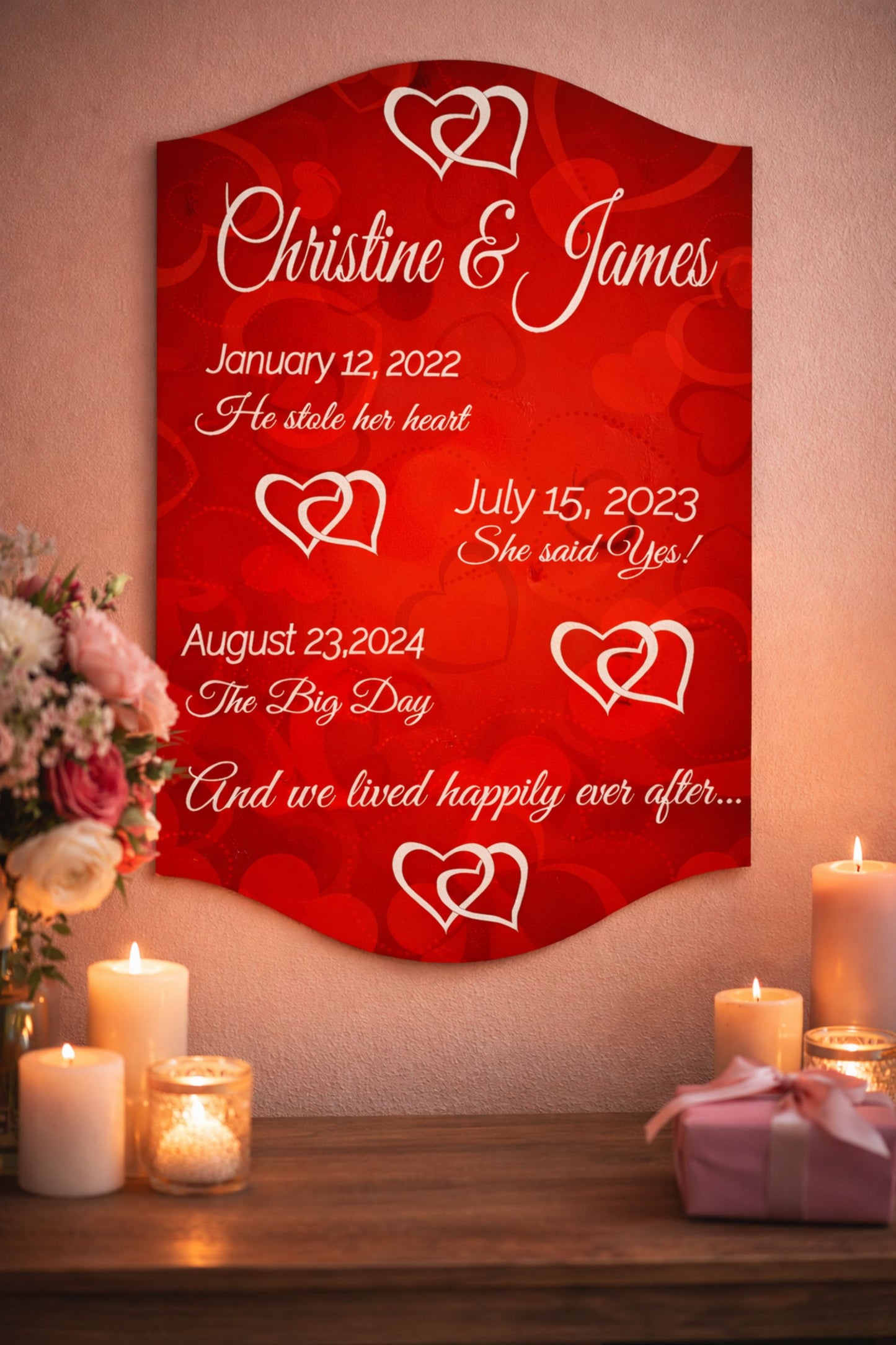 Romantic anniversary wall sign displayed with candles and soft lighting