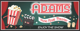 Personalized home theater sign with retro neon lettering, featuring illustrations of dancing popcorn, a clapboard, and movie tickets. All lines of text are editable. Sign does not light up but gives the effect of neon lighting. Perfect for adding nostalgic charm to your home movie theater.