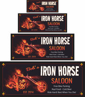 Custom personalized biker bar welcome sign with editable text, featuring a custom chopper, red-hot flames, Satan skull imagery, a crazy biker gang member, and an iconic iron cross.