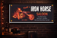 Custom biker bar sign displayed on a dark interior wall in a home bar setting
