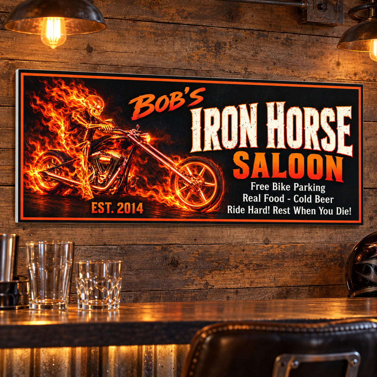 Personalized Iron Horse Saloon sign mounted on a rustic wood wall above a home bar with warm lighting, drinking glasses, and a motorcycle helmet.