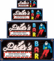 Personalized retro wall art featuring a football player, customizable with six sports balls (football, hockey, golf, soccer, baseball, or basketball) and editable text in retro neon-style lettering. Sign colors are coordinated with the team colors of your choice. Ideal for bars, man caves, or as a gift for sports fans.
