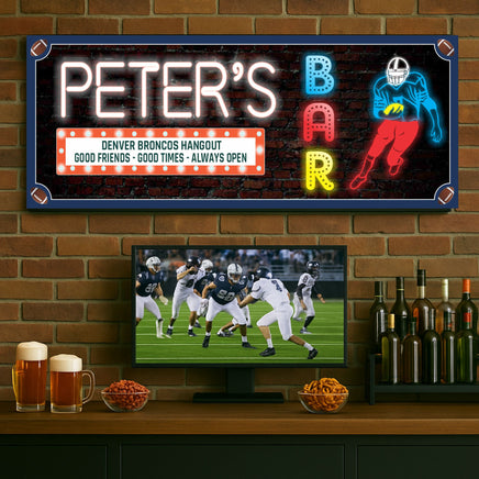 Custom sports bar sign displayed in a home bar with TV and game-day decor