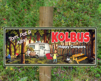 Personalized RV sign with a man in a hammock, woman barbecuing, and choice of pet, featuring editable text