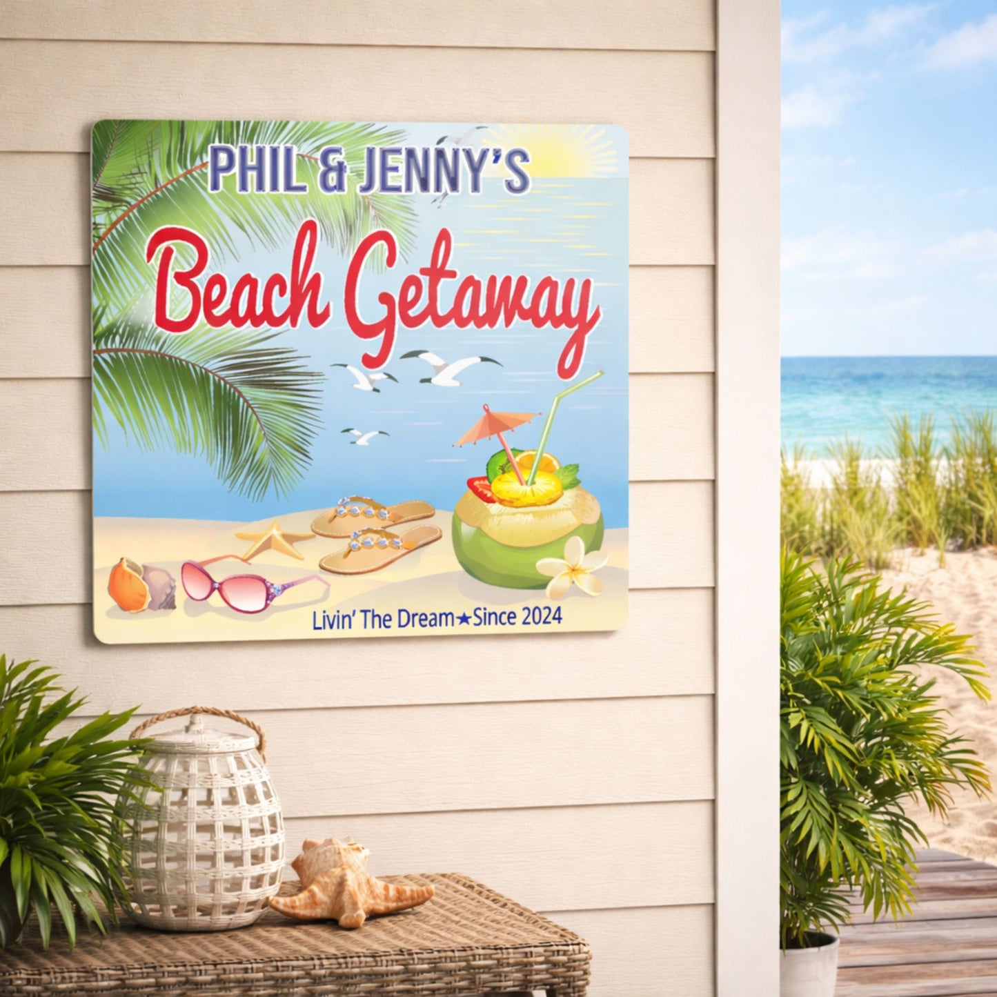 Personalized beach getaway sign displayed on an exterior wall near a coastal porch setting