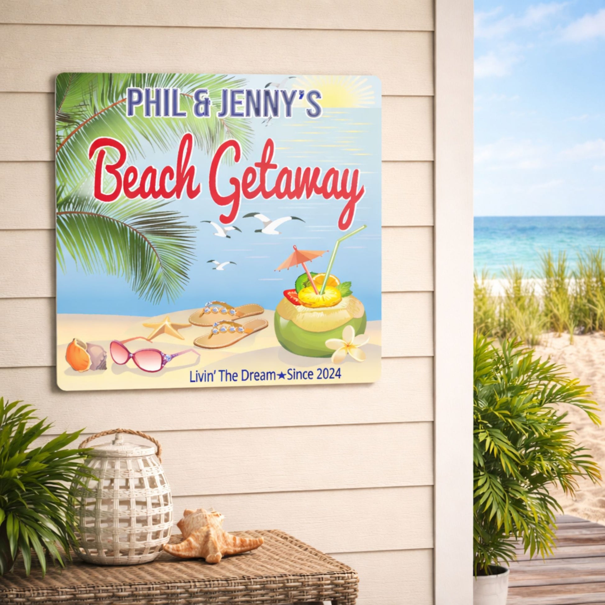 Personalized beach getaway sign displayed on an exterior wall near a coastal porch setting