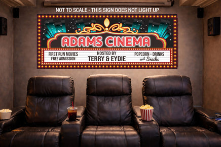 Custom home theater sign displayed above theater seating with classic movie room decor